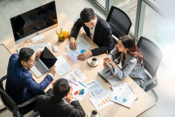 a corporate team at a meeting table