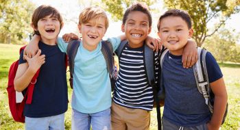 Children smile on a school field trip